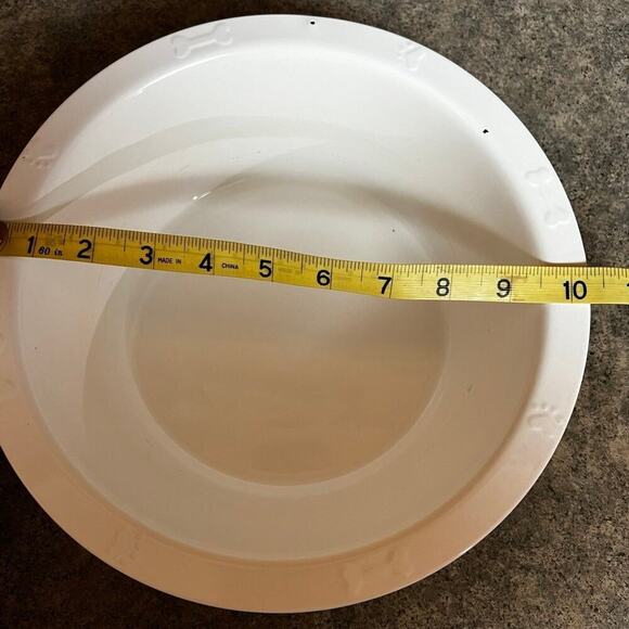 Enamel dog food or water bowl.  Paw prints & bones adorn rim - Picture 4 of 8